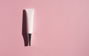 The best eye creams for dark circles, wrinkles, bags, and puffy eye bags. Shop for eye creams. Eye cream on a pink background.